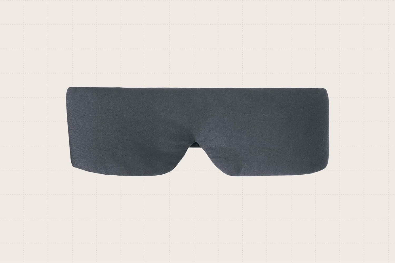 Weighted eye mask shown in Asteroid Grey. It has some heft but looks very soft. On the back (not pictured), there are two fabric-covered elastic bands to keep the mask secure.