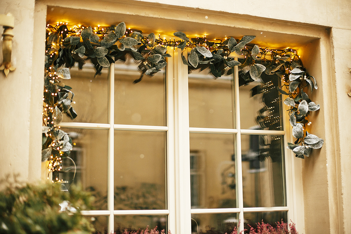 Festive garland and decor in a doorway