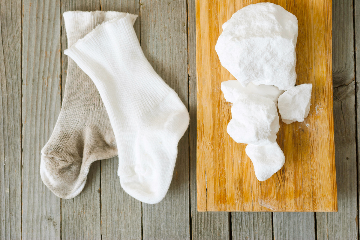 washing chemicals with dirty and clean white socks